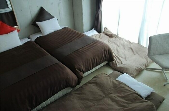 Imagen de la habitación del Hotel Condominio Makishi. Foto 11