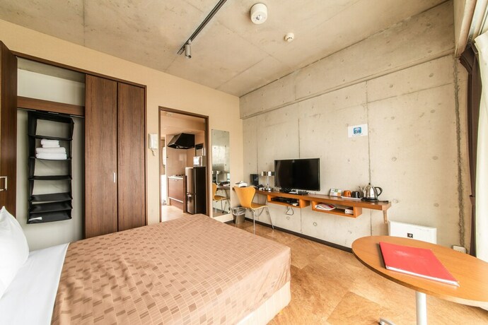 Imagen de la habitación del Hotel Condominio Makishi. Foto 16