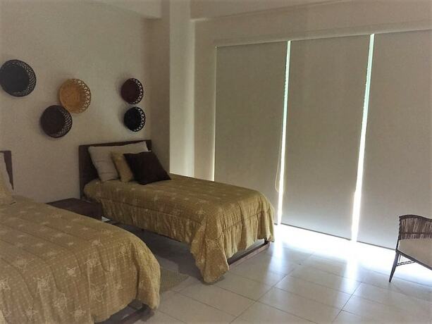 Imagen de la habitación del Hotel Condominio Marina. Foto 15