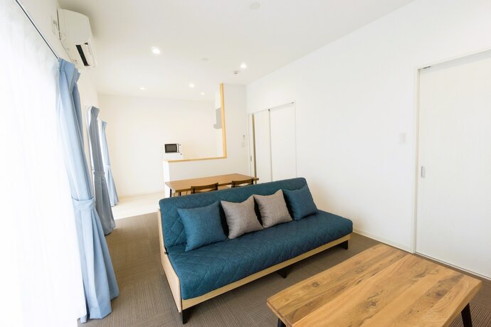 Imagen de la habitación del Hotel Condominio Miyako Airport. Foto 12