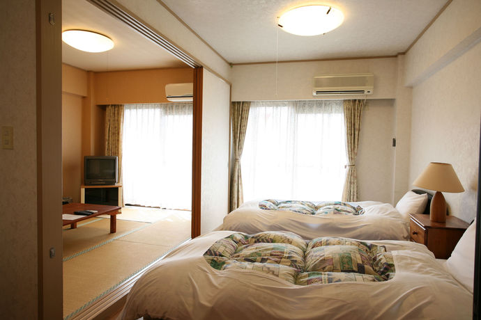 Imagen de los interiores del Hotel Condominium Garland Court Usami. Foto 12