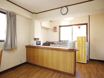 Imagen de la habitación del Hotel Condominium Garland Court Usami. Foto 5