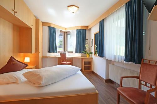 Imagen de la habitación del Hotel Condor, Selva di Val Gardena. Foto 6