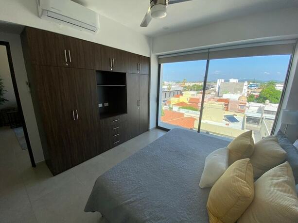 Imagen de la habitación del Hotel Condos B404 By Trvl2hm Mazatlan Regency. Foto 10