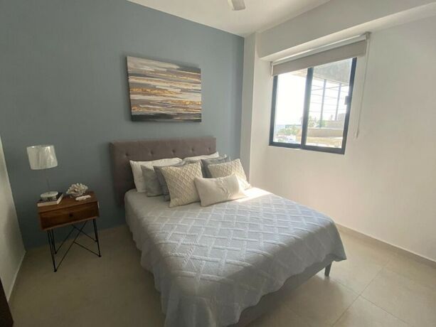 Imagen de la habitación del Hotel Condos B404 By Trvl2hm Mazatlan Regency. Foto 11