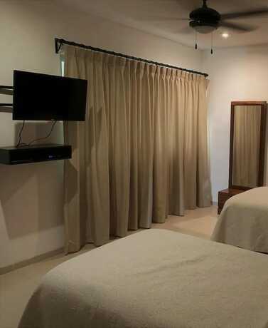Imagen de la habitación del Hotel Condos Cmarina. Foto 9