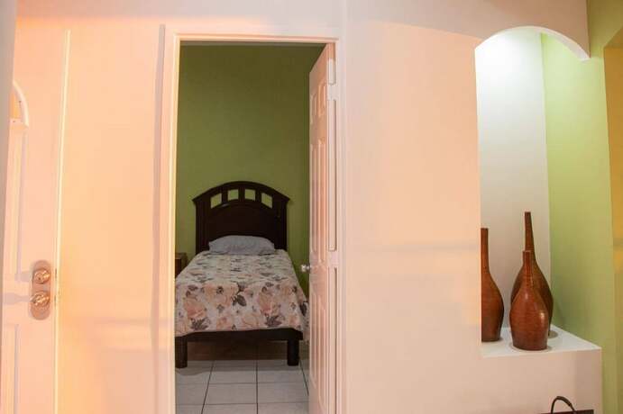 Imagen de la habitación del Hotel Condos PDS. Foto 11