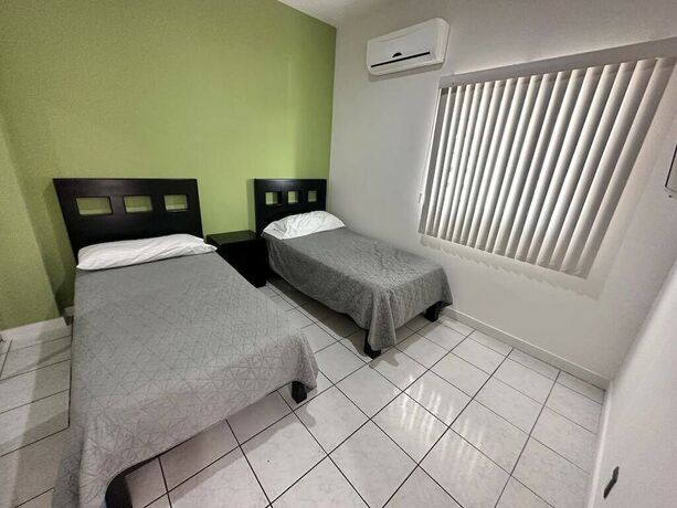 Imagen de la habitación del Hotel Condos Puesta DS ByTrvl2hm. Foto 11