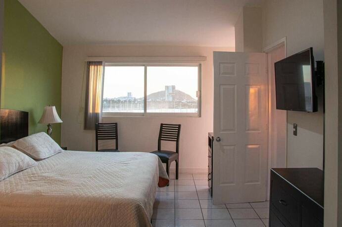 Imagen de la habitación del Hotel Condos Puesta DS ByTrvl2hm. Foto 12