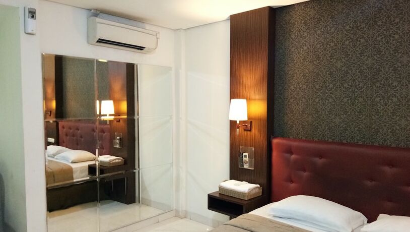 Imagen de la habitación del Hotel C'one Cempaka Putih Powered By Archipelago. Foto 12