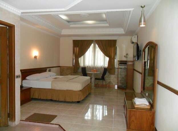 Imagen de la habitación del Hotel C'one Cempaka Putih Powered By Archipelago. Foto 13