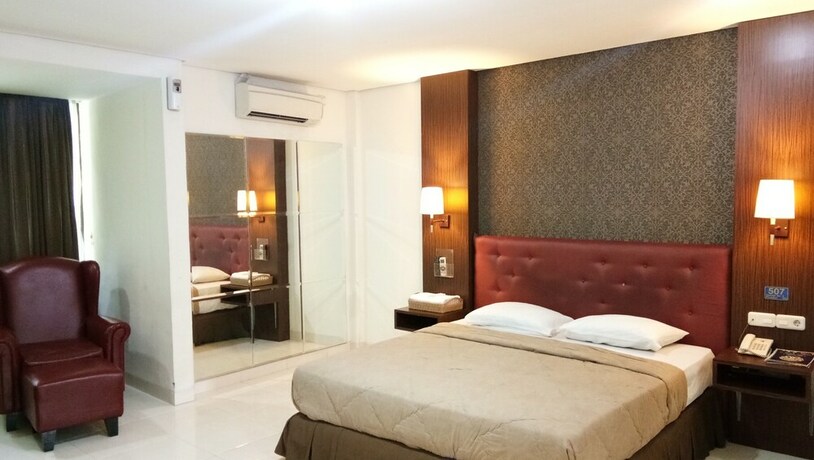 Imagen de la habitación del Hotel C'one Cempaka Putih Powered By Archipelago. Foto 14