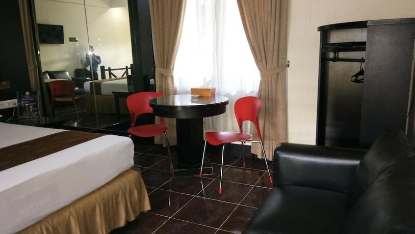 Imagen de la habitación del Hotel C'one Cempaka Putih Powered By Archipelago. Foto 15