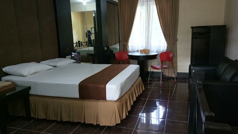 Imagen de la habitación del Hotel C'one Cempaka Putih Powered By Archipelago. Foto 16