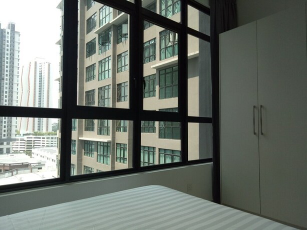 Imagen de la habitación del Hotel Conezion Residence IOI Resort City. Foto 12