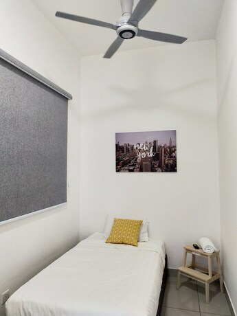 Imagen de la habitación del Hotel Conezion Residence IOI Resort City. Foto 13