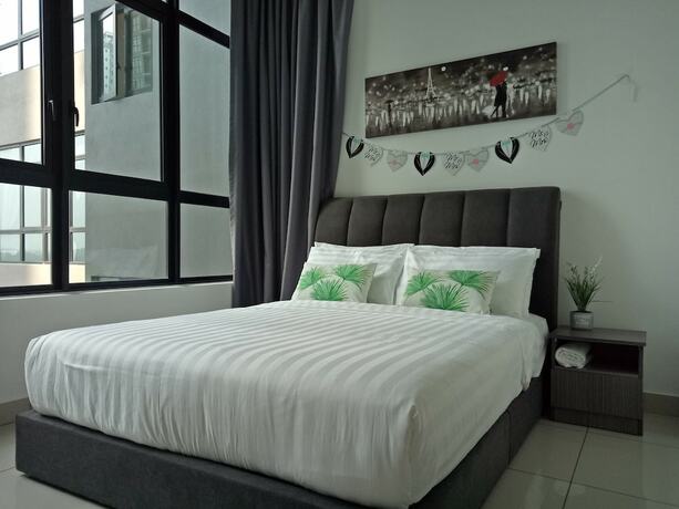 Imagen de la habitación del Hotel Conezion Residence IOI Resort City. Foto 15