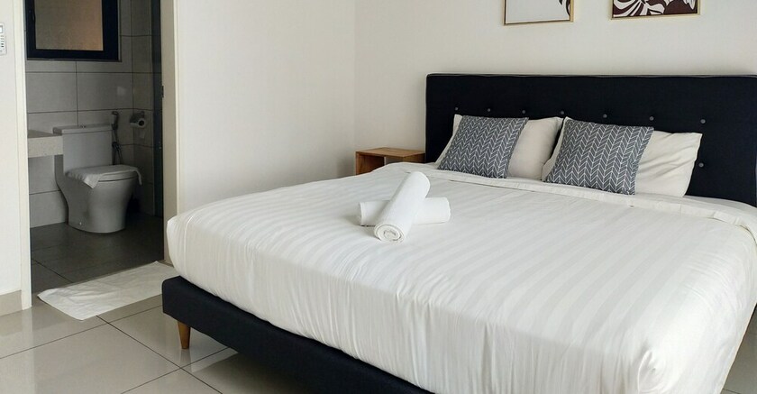 Imagen de la habitación del Hotel Conezion Residence IOI Resort City. Foto 16