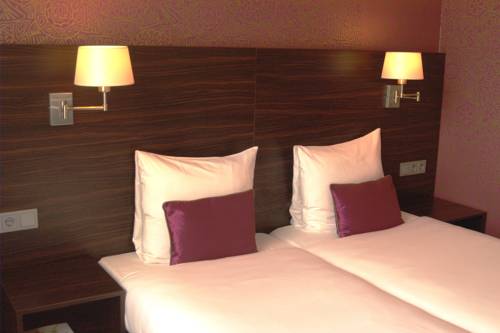 Imagen de la habitación del Hotel Conferentiehotel Kontakt Der Kontinenten. Foto 14