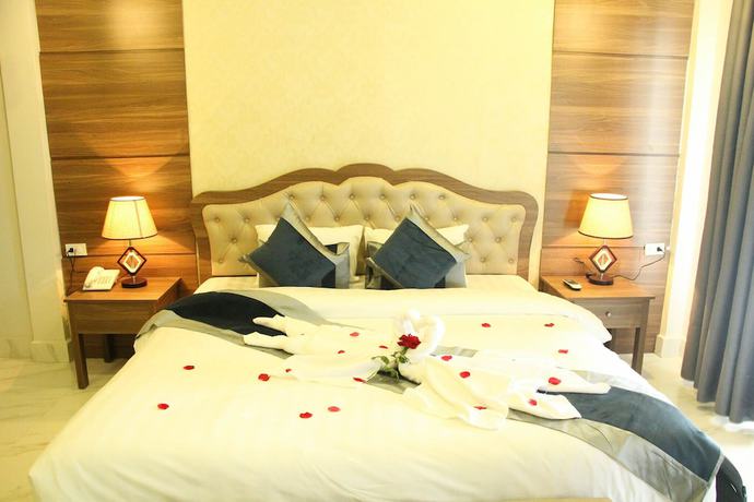 Imagen de la habitación del Hotel Confetti Garden Resort. Foto 7