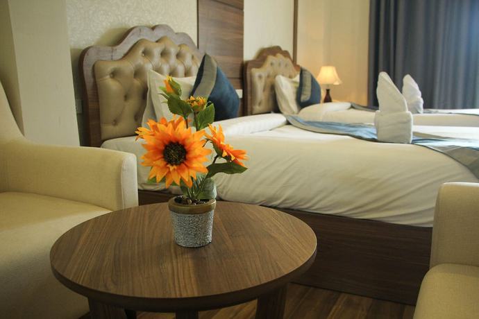 Imagen de la habitación del Hotel Confetti Garden Resort. Foto 9