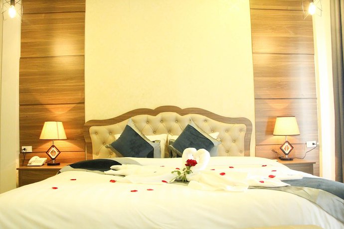 Imagen de la habitación del Hotel Confetti Garden Resort. Foto 11