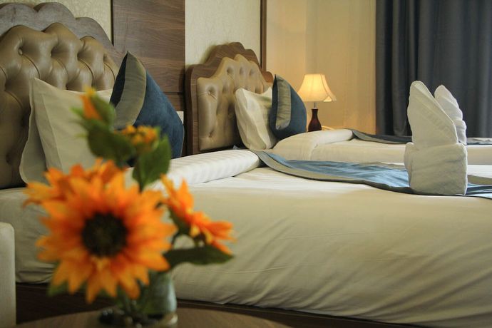 Imagen de la habitación del Hotel Confetti Garden Resort. Foto 15