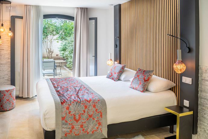 Imagen de la habitación del Hotel Confidentiel hôtel. Foto 13