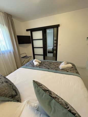 Imagen de la habitación del Hotel Confidentiel hôtel. Foto 15