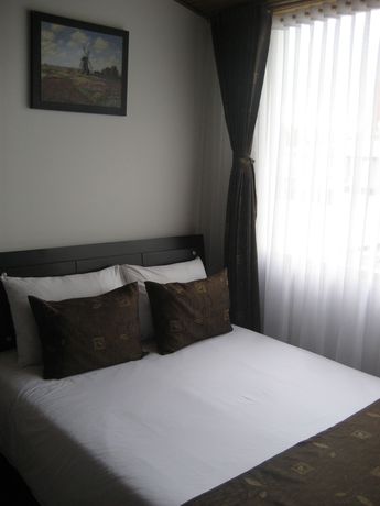 Imagen de la habitación del Hotel Confort Bogota. Foto 2