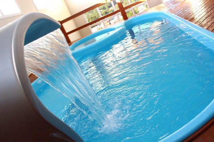 Imagen de la piscina del Hotel Confort Fronteira. Foto 19