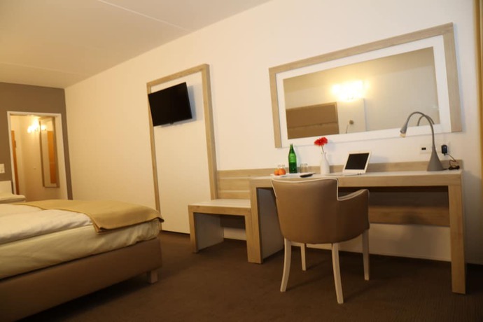 Imagen de la habitación del Hotel Confour. Foto 2