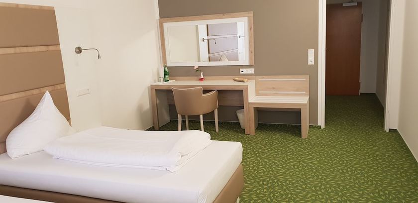 Imagen de la habitación del Hotel Confour. Foto 3