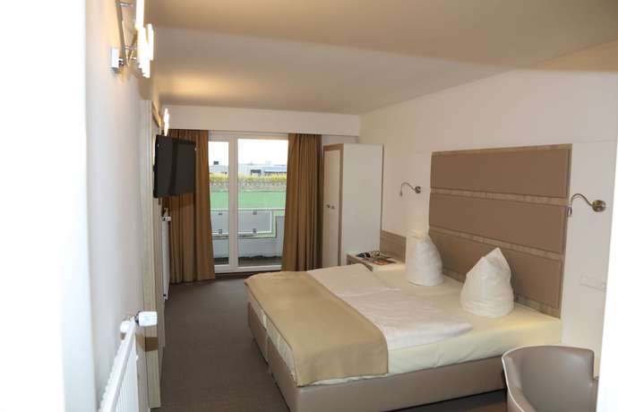Imagen de la habitación del Hotel Confour. Foto 5