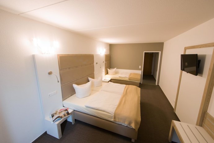 Imagen de la habitación del Hotel Confour. Foto 6