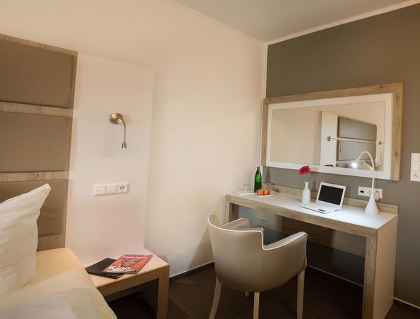 Imagen de la habitación del Hotel Confour. Foto 8