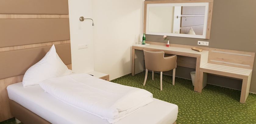 Imagen de la habitación del Hotel Confour. Foto 12