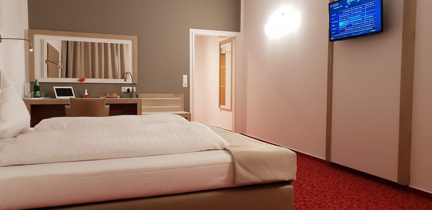 Imagen de la habitación del Hotel Confour. Foto 14