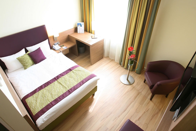 Imagen de la habitación del Hotel Congress Am Stadtpark. Foto 6