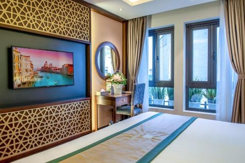 Imagen de la habitación del Hotel Conifer Grand. Foto 7