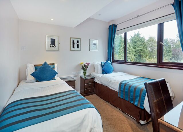 Imagen de la habitación del Hotel Conifers Guest House. Foto 14