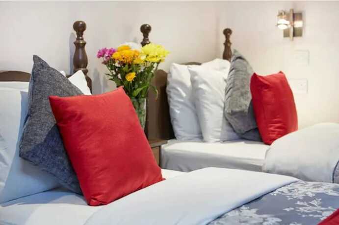 Imagen de la habitación del Hotel Conifers Guest House. Foto 17