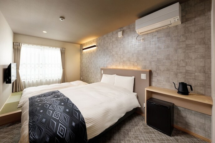 Imagen de la habitación del Hotel Connect Inn Gionshijo. Foto 31