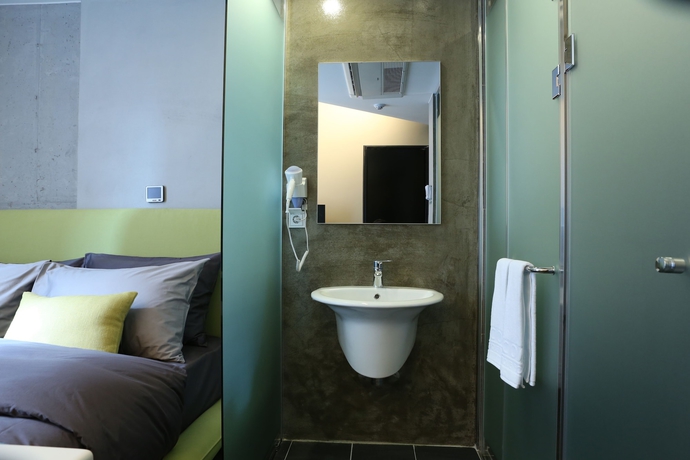 Imagen de la habitación del Hotel Connected Hotel Guro. Foto 7