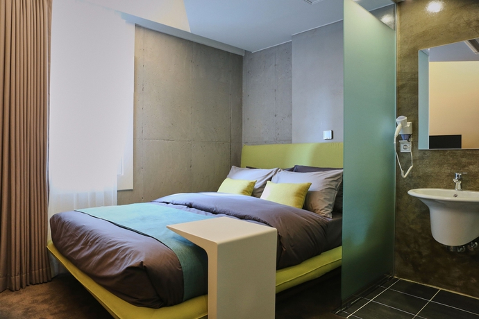 Imagen de la habitación del Hotel Connected Hotel Guro. Foto 9