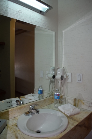 Imagen de la habitación del Hotel Conquistador Inn By Us Consulate. Foto 3