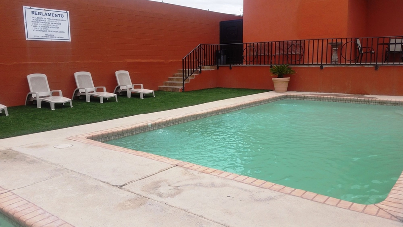 Imagen de la piscina del Hotel Conquistador Inn By Us Consulate. Foto 14