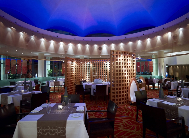 Imagen del bar/restaurante del Hotel Conrad Athens The Ilisian. Foto 2