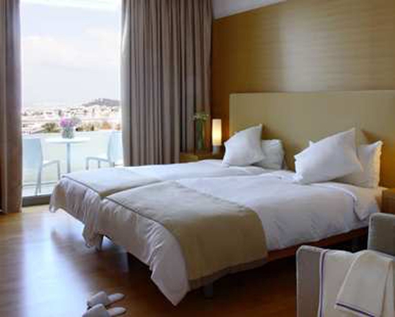 Imagen de la habitación del Hotel Conrad Athens The Ilisian. Foto 10
