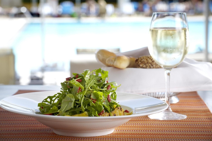 Imagen del bar/restaurante del Hotel Conrad Athens The Ilisian. Foto 8